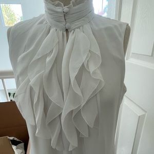 Another beautiful top you need for your closet by WHBM.